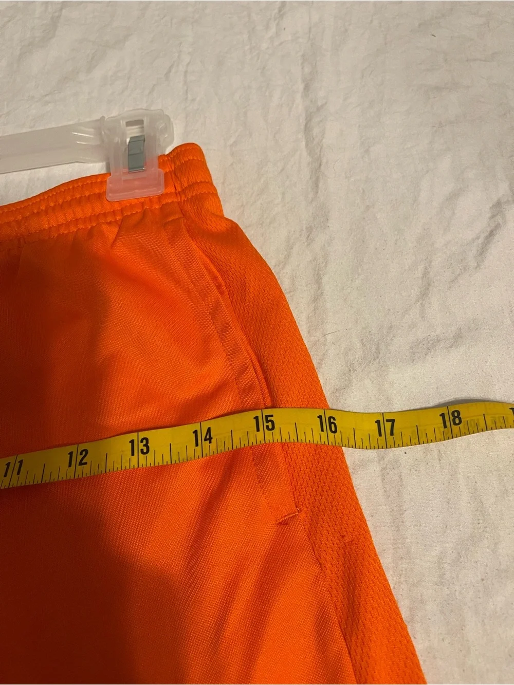 Nike Girl's Bright Orange Athletic Shorts with White Swoosh